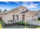 Charming one-story home with a well-manicured lawn and tasteful landscaping in a desirable community at 3214 Bayou Bay Dr, Lakeland, FL 33811