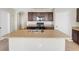 Open concept kitchen with a central island and ample counter space at 3214 Bayou Bay Dr, Lakeland, FL 33811