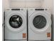 Modern laundry room with front loading white Whirlpool washer and dryer set at 5421 Sw 82Nd Ter, Ocala, FL 34481