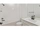 Bathroom with a combo tub and shower, toilet, and single vanity at 9009 Sw 52Nd Place Rd, Ocala, FL 34481