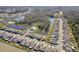 Community aerial view featuring residences, ponds, community pool, and green spaces at 4323 Trotters Way, Lakeland, FL 33801