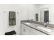 Modern bathroom with double vanity and granite countertop at 4323 Trotters Way, Lakeland, FL 33801