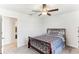 Comfortable bedroom with a decorative bed frame and neutral carpet at 4323 Trotters Way, Lakeland, FL 33801