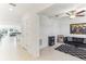 Stylish living room features a ceiling fan and an electric fireplace at 4323 Trotters Way, Lakeland, FL 33801