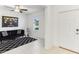 Stylish living room features a ceiling fan and a modern black and white rug at 4323 Trotters Way, Lakeland, FL 33801