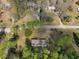 Overhead view of a secluded property with a roof and lush trees offering shade and privacy at 10774 Sw 185Th Ter, Dunnellon, FL 34432