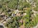 An aerial perspective highlights homes surrounded by lush greenery in a well-established neighborhood at 10774 Sw 185Th Ter, Dunnellon, FL 34432