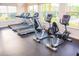 Gym with modern treadmills and stationary bikes, providing a fitness space for residents with natural light at 469 Liu Ln, Deland, FL 32724