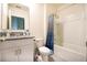 Bright bathroom featuring a vanity with granite countertop and a shower/tub combination at 469 Liu Ln, Deland, FL 32724