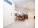 Bright foyer leading to an open-concept living space with tile flooring and ample natural light at 469 Liu Ln, Deland, FL 32724