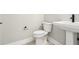 Clean bathroom with toilet and pedestal sink at 2308 Depauw Ave, Orlando, FL 32804