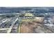 Beautiful overhead shot of the homes in the community with a lush wooded area behind the homes at 439 Toldedo Rd, Davenport, FL 33837