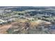 Scenic aerial view of the planned homes in the community with landscaping and natural wooded area at 439 Toldedo Rd, Davenport, FL 33837