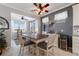 Dining area with seating for four, adjacent to living area with natural light at 439 Toldedo Rd, Davenport, FL 33837