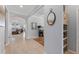 Open foyer with tile flooring, arched doorway and a view into the adjacent living area with furniture and decor at 439 Toldedo Rd, Davenport, FL 33837