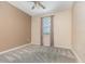 Bedroom featuring neutral walls and carpet, plus a window with natural light and views at 1006 Breggia Ct, Haines City, FL 33844