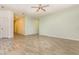 Inviting living room with tile floors and access to multiple rooms in the house at 1006 Breggia Ct, Haines City, FL 33844