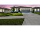 Charming one-story home with a two-car garage, manicured lawn, and inviting curb appeal in a quiet neighborhood at 1671 Ruby Ln, Lake Alfred, FL 33850