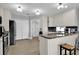 Kitchen featuring stainless steel appliances, a refrigerator and lots of cabinets at 2410 Berkshire Ct, Kissimmee, FL 34746