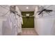 Organized walk-in closet with ample shelving and hanging space for storage at 342 Wayland Dr, Haines City, FL 33844