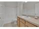 Bathroom featuring a single sink vanity with tub and shower combo at 3890 Wood Thrush Dr, Kissimmee, FL 34744