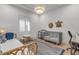 Charming bedroom with crib, daybed, rug, and light fixture, creating a cozy atmosphere at 472 Desoto Dr, New Smyrna Beach, FL 32169