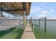 Picture of a boat lift ready to hoist your boat from the calm waters for protection and convenience at 472 Desoto Dr, New Smyrna Beach, FL 32169