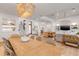 Open floor plan with dining area, staircase, and living room, perfect for modern living at 472 Desoto Dr, New Smyrna Beach, FL 32169
