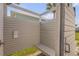 Convenient outdoor shower with privacy screen and stylish design near the pool at 472 Desoto Dr, New Smyrna Beach, FL 32169