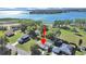 Aerial view of property near lake, highlighted with an arrow for easy location at 917 E Valencia St, Lakeland, FL 33805