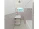 A quaint bathroom featuring a shower and tub, as well as a sink and toilet at 917 E Valencia St, Lakeland, FL 33805