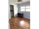 Bedroom featuring blue walls, closet, and dark wood desk at 917 E Valencia St, Lakeland, FL 33805