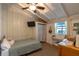 Bedroom with white plank walls, neutral carpet, and a window at 1730 John Arthur Way, Lakeland, FL 33803