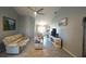 Comfortable living room featuring neutral tones, vaulted ceilings, and a welcoming atmosphere at 891 Galloway St, Lake Alfred, FL 33850