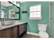 Stylish bathroom features a bowl sink, and modern finishes at 17416 Magnolia Island Blvd, Clermont, FL 34711