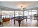 Relaxing game room with tile flooring and a view of the pool and patio at 4739 Tierra Alta Ct, Lakeland, FL 33813