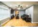 Bright living room featuring hardwood floors, large windows, and comfortable seating at 4739 Tierra Alta Ct, Lakeland, FL 33813