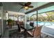 Covered patio with a ceiling fan, a seating area, and a view of the pool area at 4739 Tierra Alta Ct, Lakeland, FL 33813