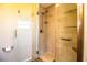 Bright and updated walk in shower features include glass door, updated fixtures and a built in bench at 4739 Tierra Alta Ct, Lakeland, FL 33813