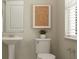 Cozy powder room featuring a pedestal sink, neutral decor and a framed piece of art at 9533 Passaic Pkwy, Orlando, FL 32829