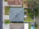 Aerial view of the property showcasing a well-maintained roof, a spacious backyard and a concrete patio with a gazebo at 2448 Brownwood Dr, Mulberry, FL 33860