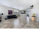 Expansive living room with tile flooring, a ceiling fan, and neutral-toned walls at 2448 Brownwood Dr, Mulberry, FL 33860