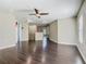 Open-concept living room with hardwood floors, neutral paint, ceiling fan, and recessed lighting at 2448 Brownwood Dr, Mulberry, FL 33860