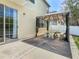 Covered outdoor dining area extends the home's living space and provides a place for relaxation and entertainment at 2448 Brownwood Dr, Mulberry, FL 33860