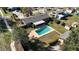 Aerial view showcases the home with a backyard pool and an outbuilding at 800 22Nd Nw St, Winter Haven, FL 33881