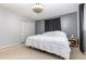 Cozy bedroom with neutral walls, window with black curtains, and spacious closet at 800 22Nd Nw St, Winter Haven, FL 33881