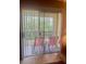 Sunny patio showcasing a pair of chairs, perfect for relaxing and outdoor dining at 101 Bent Tree Dr # 12, Daytona Beach, FL 32114