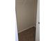 This is an empty closet with tile floor and closet rack with metal bar for hanging clothing at 315 Villa Sorrento Cir, Haines City, FL 33844