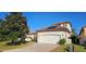 Charming single Gathering home with a two car garage, tile roof and solar panels on the roof at 315 Villa Sorrento Cir, Haines City, FL 33844