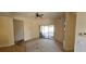 Bright living room featuring neutral walls, a ceiling fan, and a sliding glass door at 315 Villa Sorrento Cir, Haines City, FL 33844
